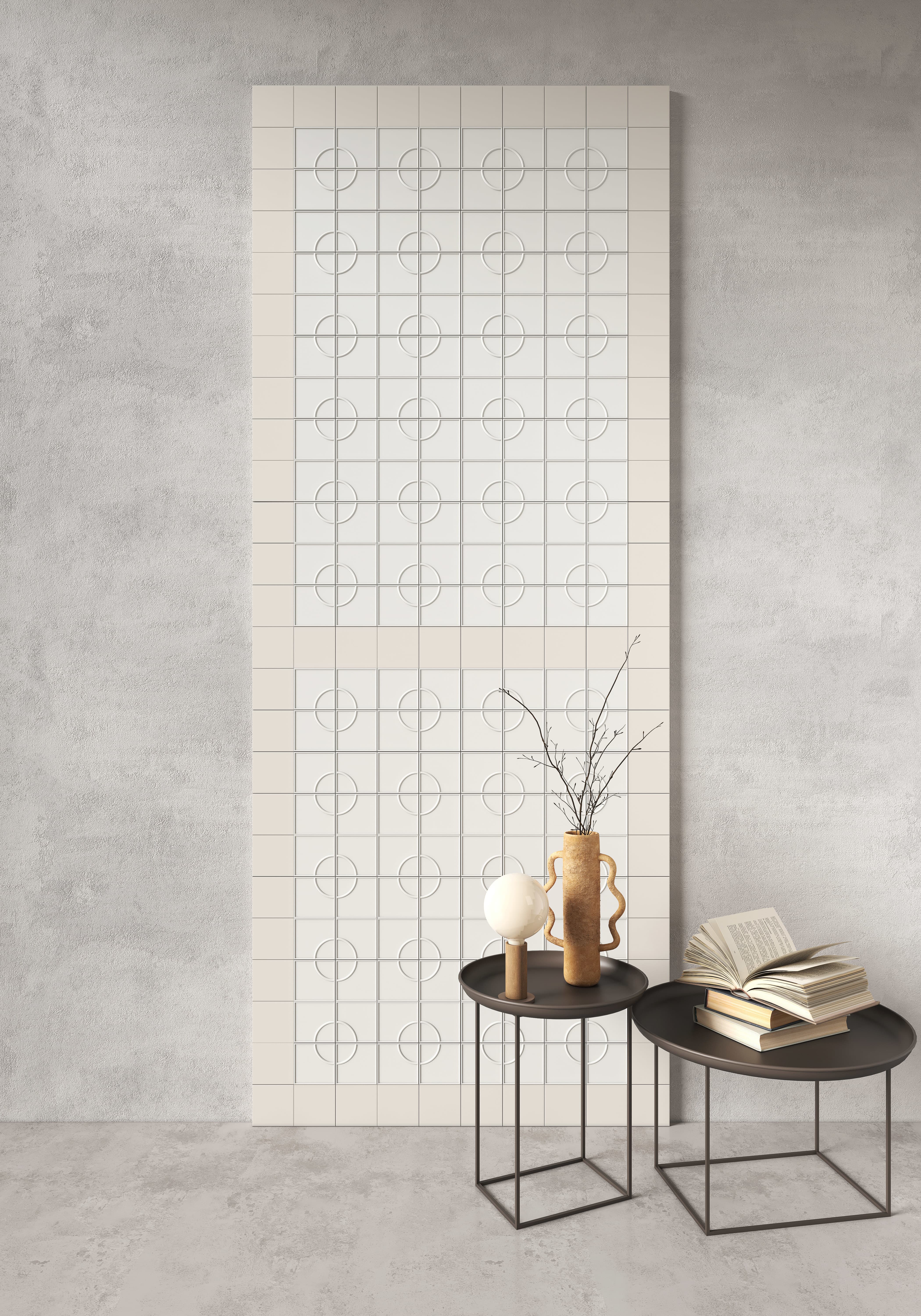 Micro Ways, by Terratinta — an off-white wall panel with concentric-circle relief, styled with black tray tables and a ceramic vase.