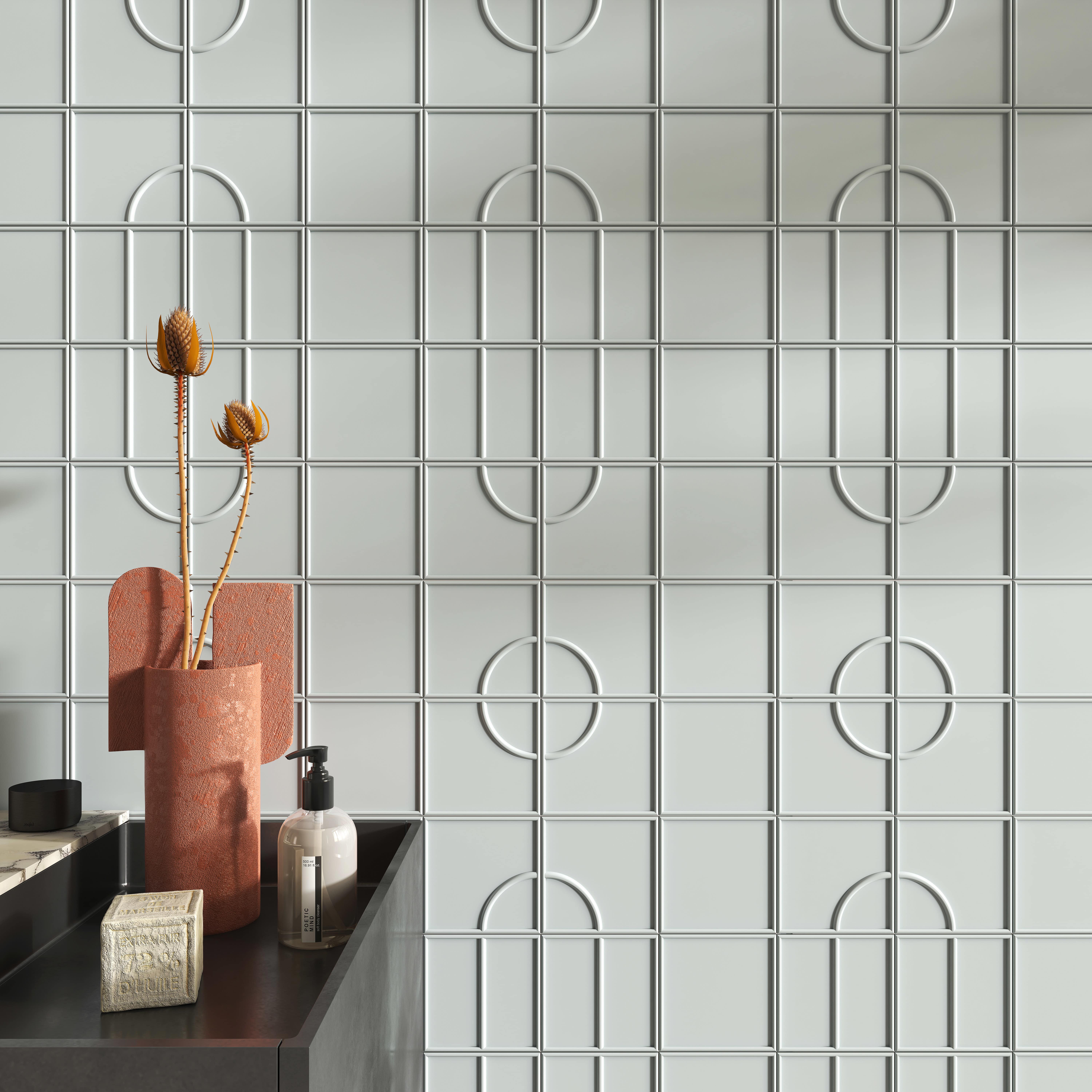 Micro Ways, by Terratinta — a bathroom lined in powder-blue oval-relief tiles, with a black tub, terracotta stool and terrazzo floor.