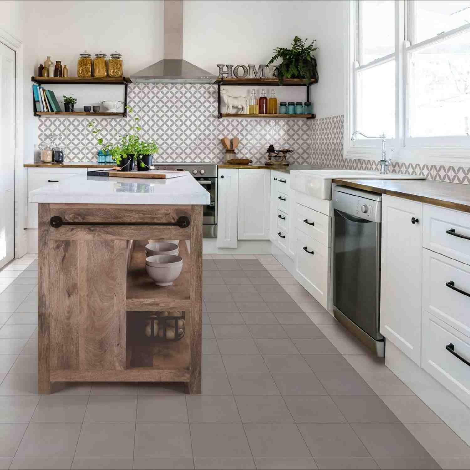 Marazzi Contrasti glazed porcelain stoneware decorative backsplash tiles in grey brown and white geometric diamond Tappeto pattern in farmhouse kitchen with white cabinets rustic wooden island industrial open shelving jars plants and stainless steel appli