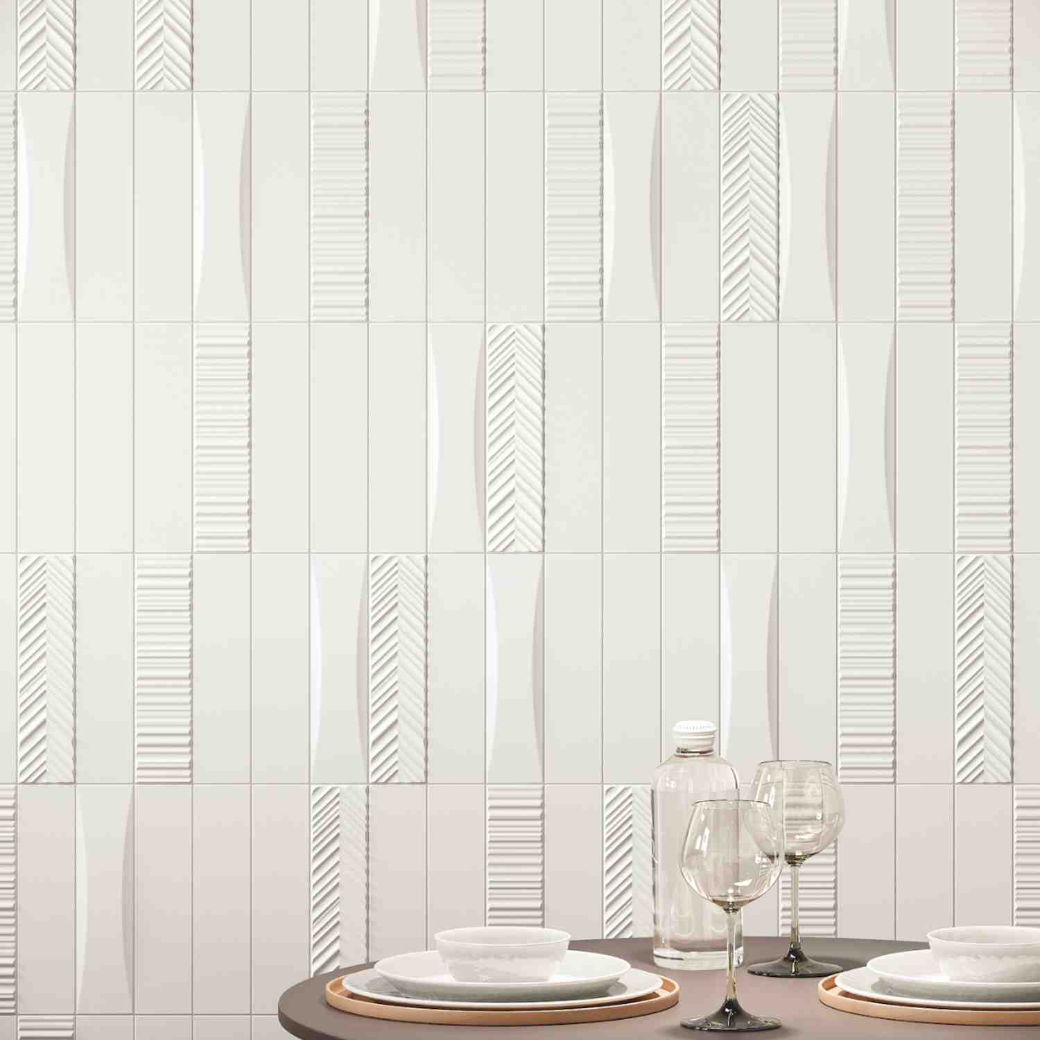 Elios Dust matte chevron ceramic wall tiles in ice white full wall view showing mixed chevron wave and linear relief pattern textures with three-dimensional sculptural surface in stacked bond layout