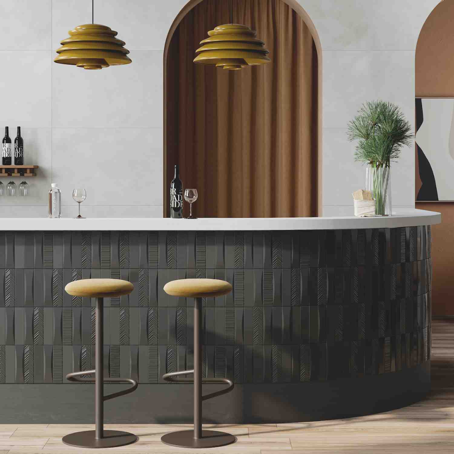 Elios Dust matte chevron ceramic tiles in ink dark charcoal installed on bar front with warm terracotta curved wall elements tiered brass pendant lights wine bottles on floating shelves bar stools with yellow cushions and fresh greenery in vase