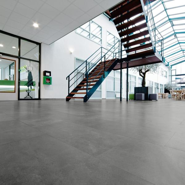Gubi Floor Dark Grey Porcelain Tile in Contemporary Office Interior