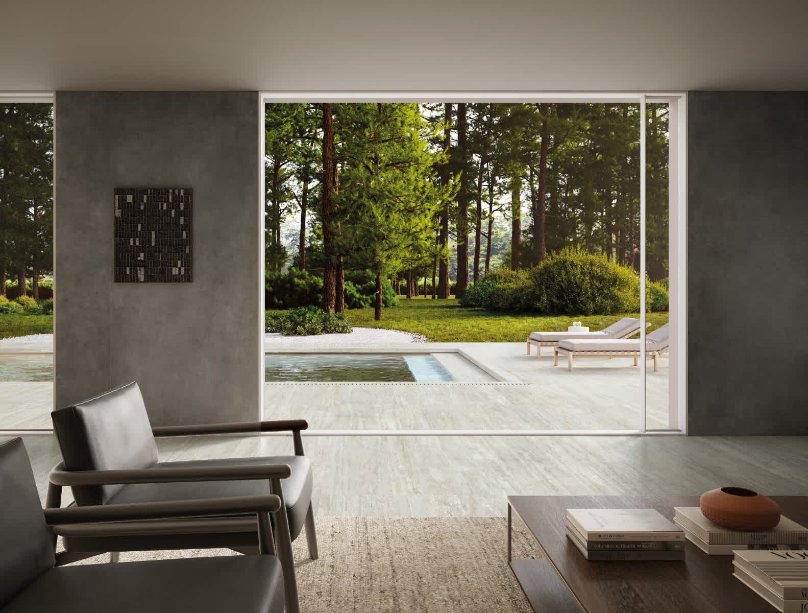 Grey Travertine Look Porcelain Floor Tile in Open Plan Living Space with Pool View