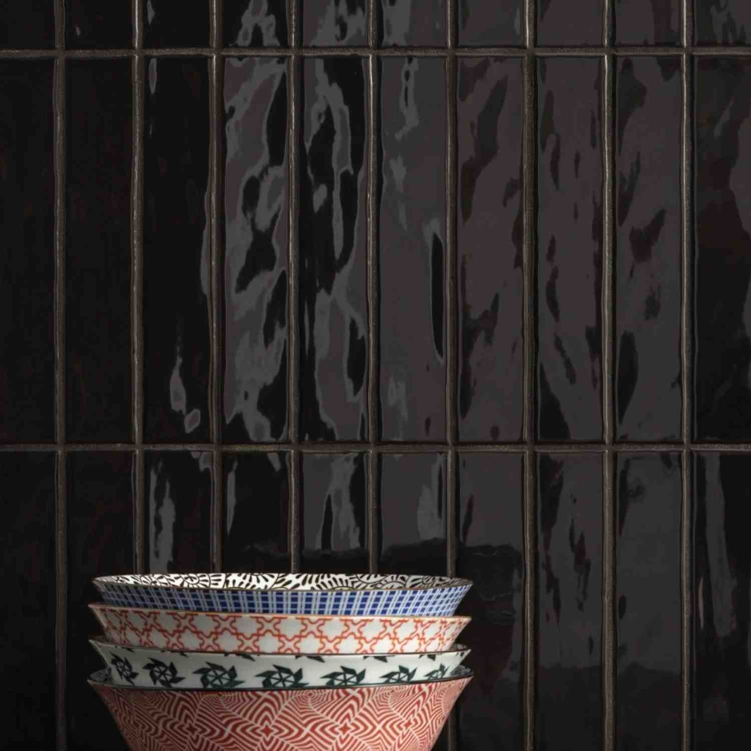 Ceramica Colli Kyushu nero glossy ceramic wall tiles in vertical 5x25cm format with rich dark lustre finish