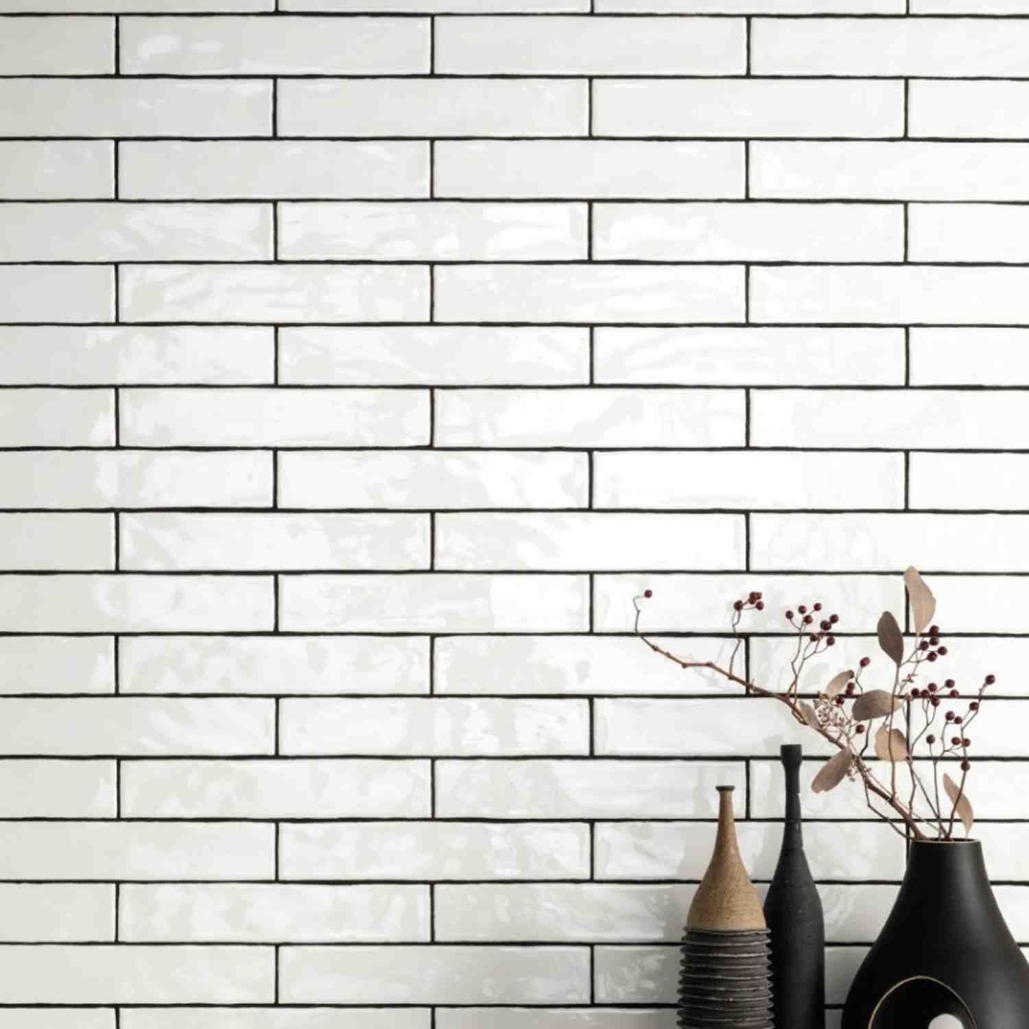 Ceramica Colli Kyushu bianco matte ceramic wall tiles in horizontal stacked bond with dried botanical branches