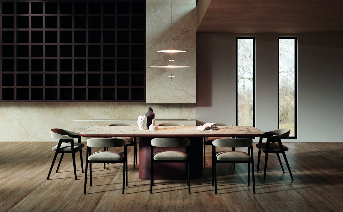Laminam Ki No Bi porcelain slab wood-look wall and cabinetry in a warm contemporary dining room with a sculptural stone table
