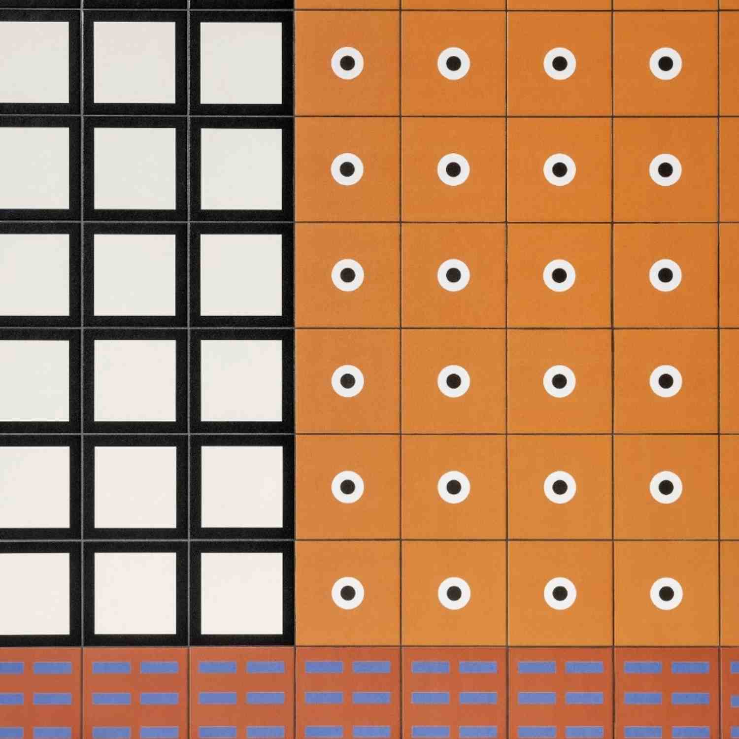 Mutina Margherita glazed porcelain stoneware graphic pattern tiles in grid layout featuring black Petals design with white squares and terracotta Point design with white circles