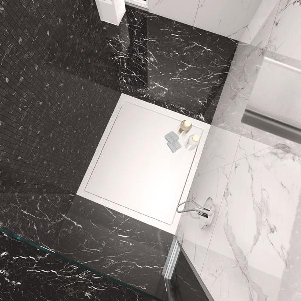 Casalgrande Marmoker polished porcelain stoneware bathroom overview with Nero Marquinia dark and Statuario white marble-look tiles and shower tray detail