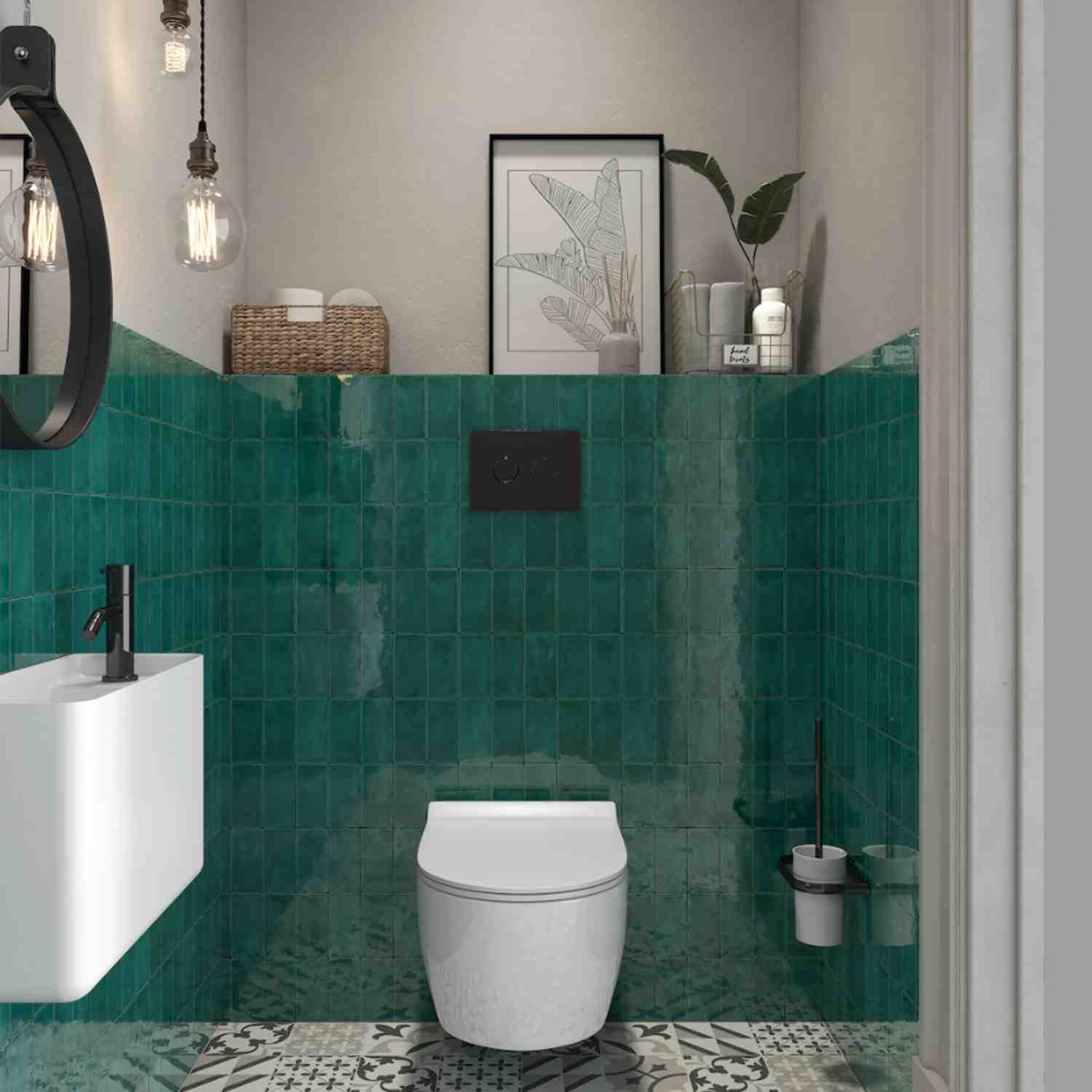 Terratinta Memorie Edera dark green glossy ceramic wall tiles as bathroom wainscoting with white pedestal sink, round black mirror, Edison bulb pendant, and botanical art