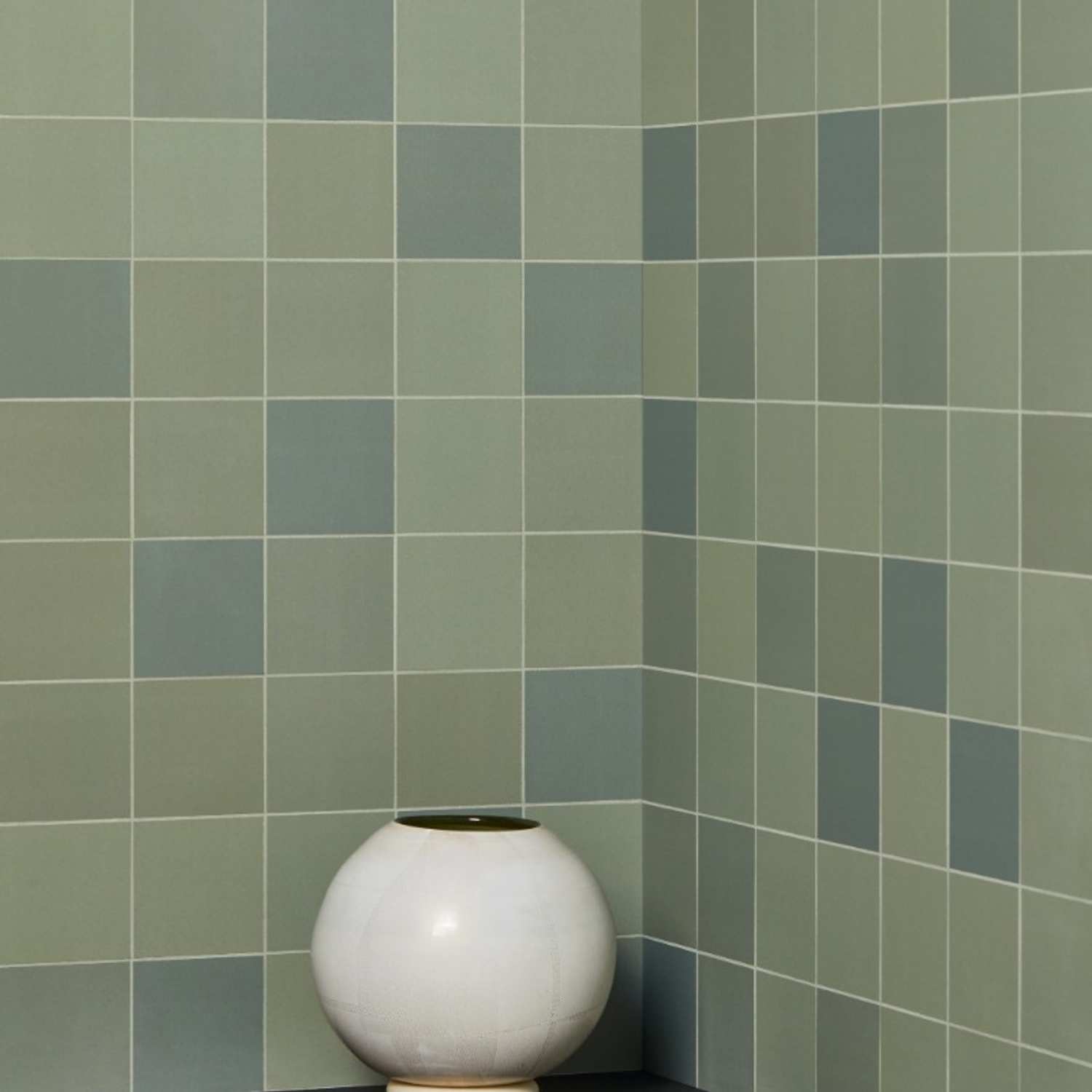 Mutina Mews Green matte porcelain tiles close-up in stacked bond pattern showing subtle tonal variations and high shade variation