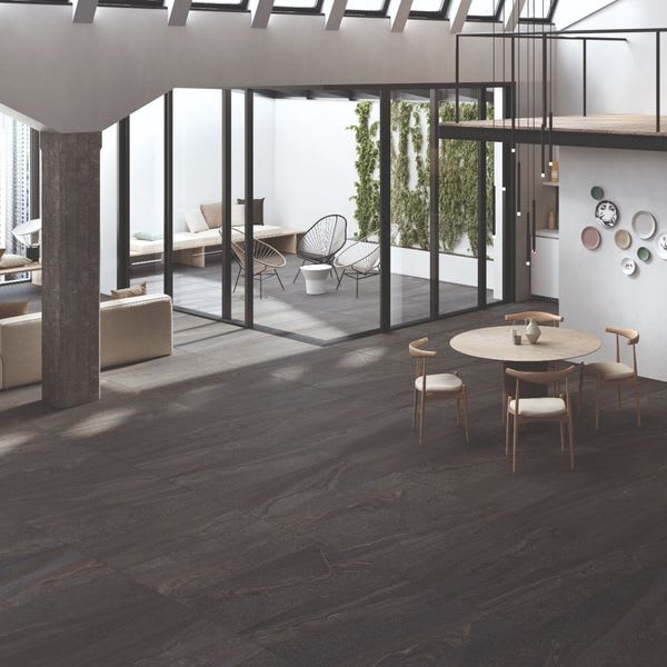 Stonehenge Anthracite Porcelain Floor Tile with Line Detail in Loft Interior