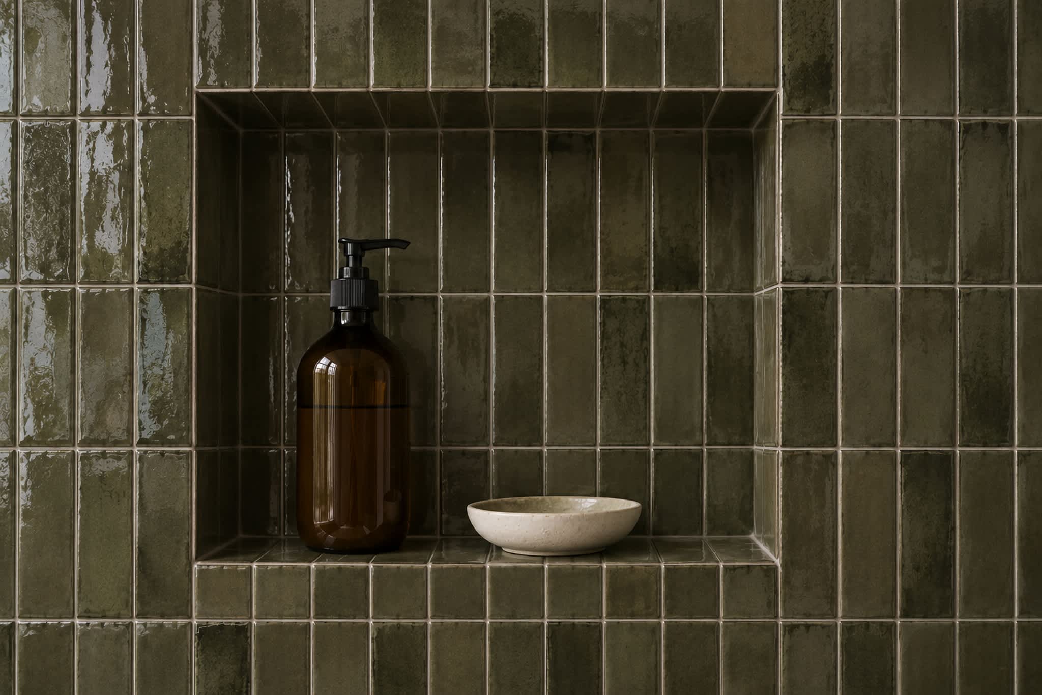 Army Green Vivid ceramic tile in a glossy stacked-vertical layout forms a shower wall with a recessed niche